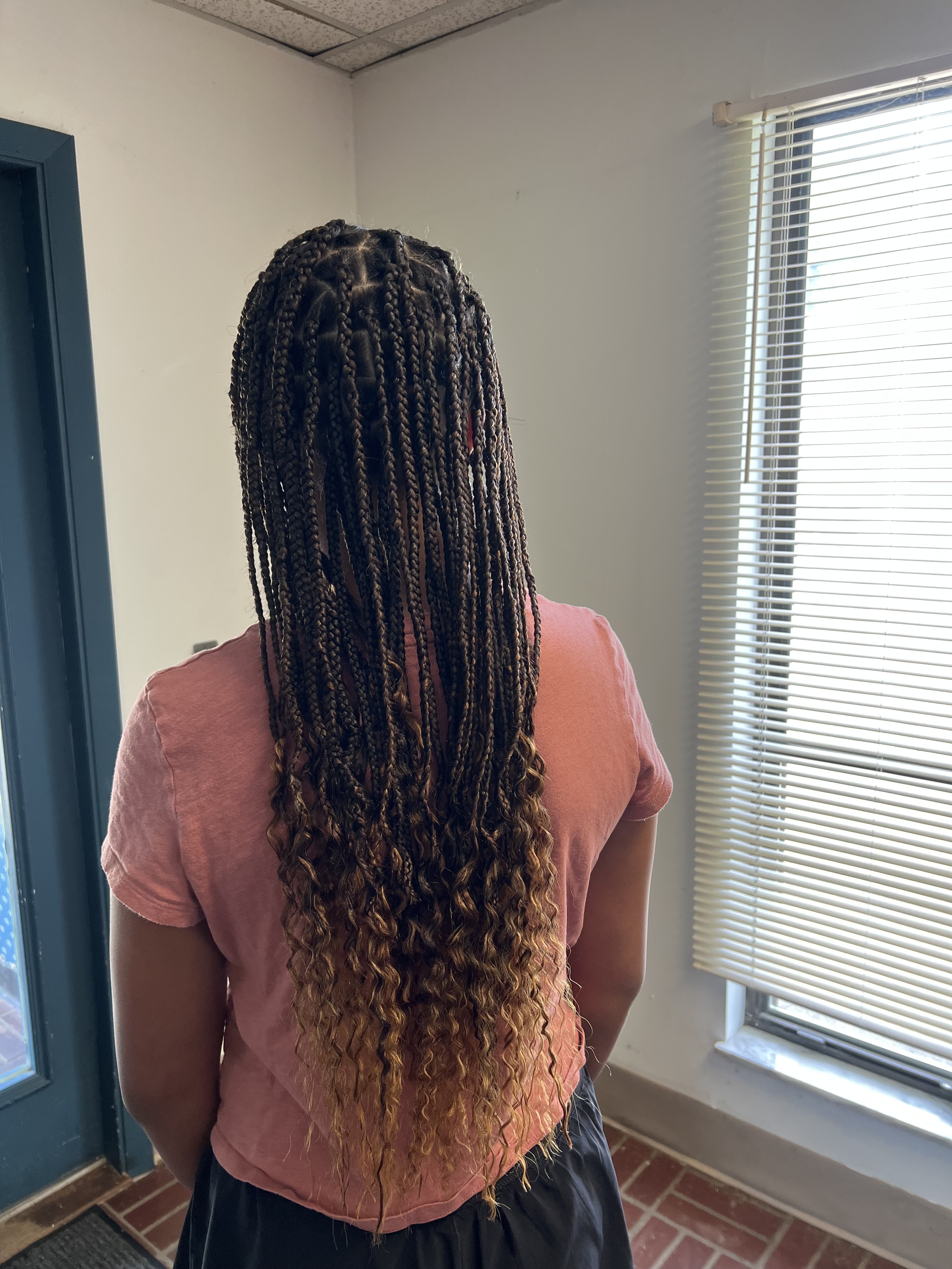 Braiding and styling at Berly's salon in McKeesport, PA