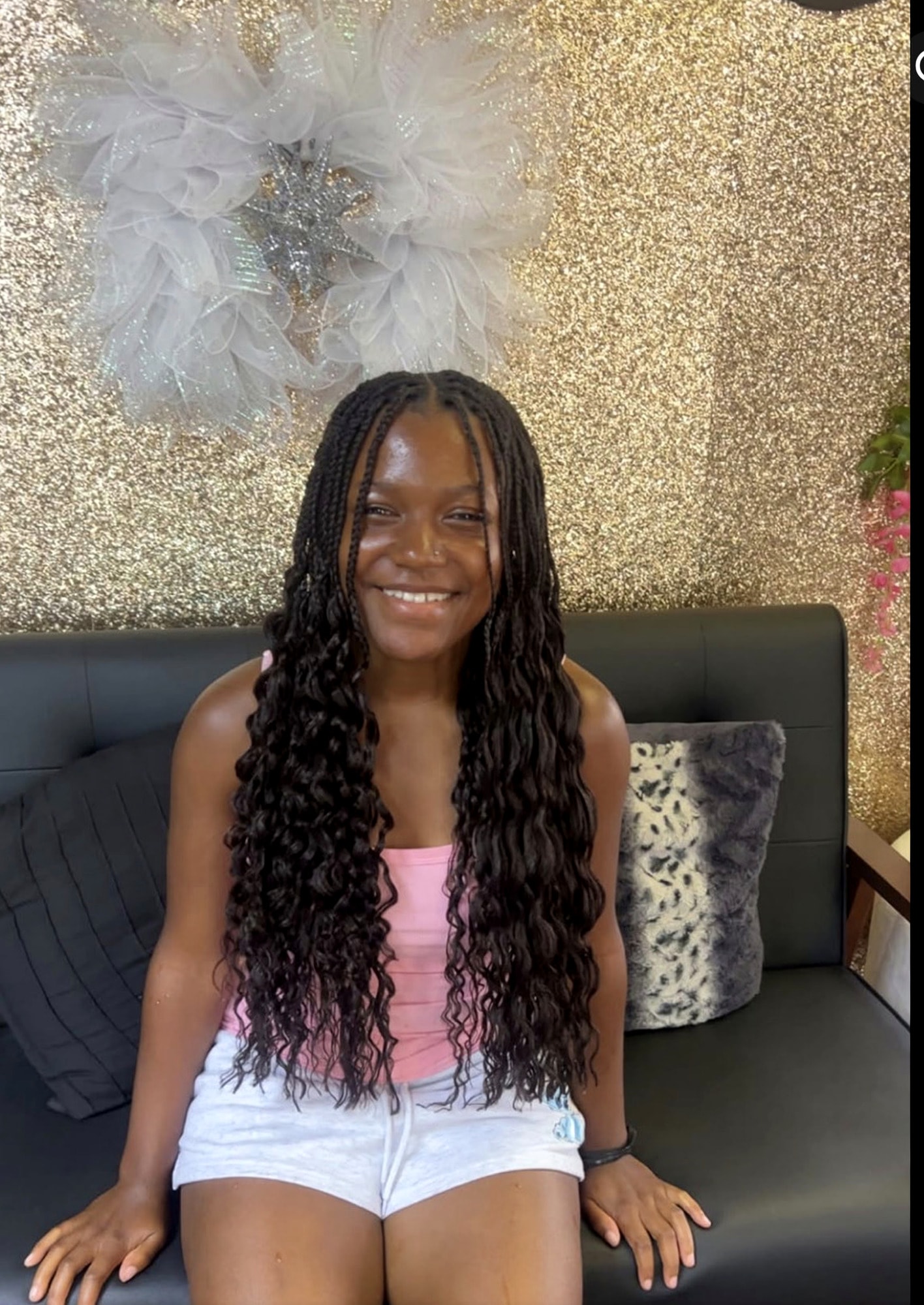 Young client with long boho wavy braids at Berly's Multi Culture Hair Braiding, McKeesport PA