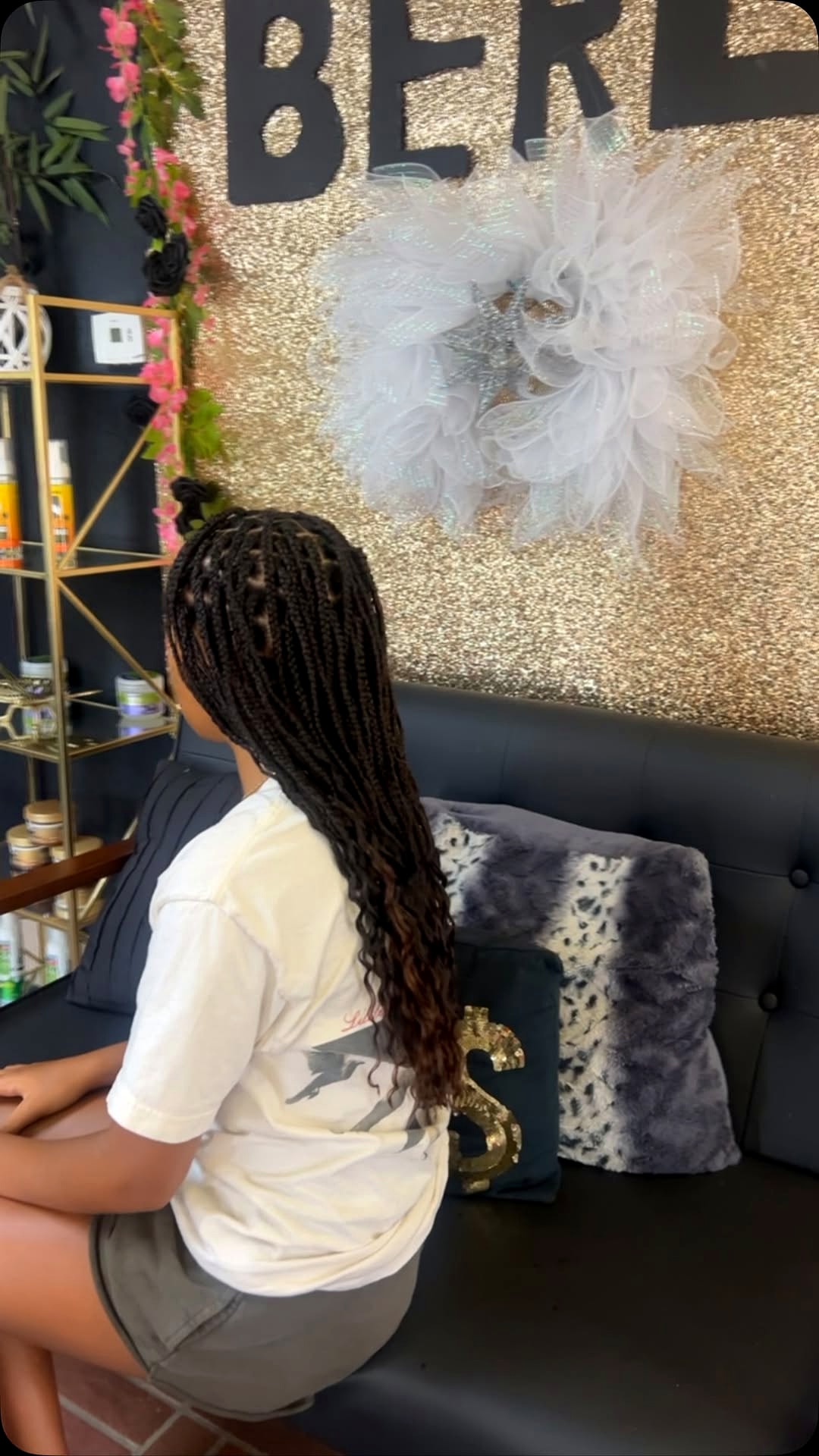 Long box braids with wavy ends at Berly's Multi Culture Hair Braiding, McKeesport PA