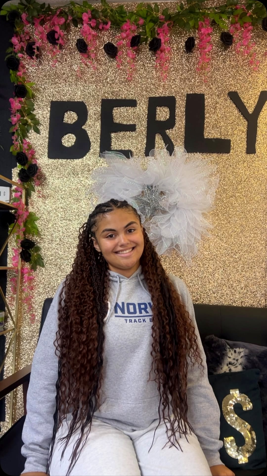Goddess braids in front of the BERLYS wall at Berly's, McKeesport PA
